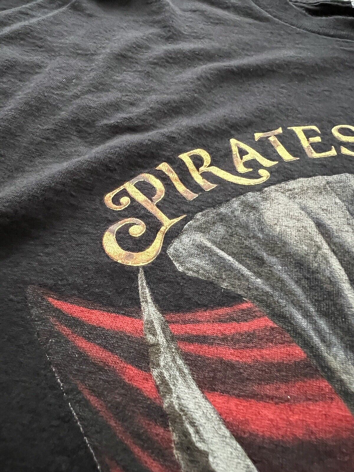 Y2K Disneyland Resort Pirates of the Caribbean T-shirt Dead Men Tell No Tales - thriftgoblin