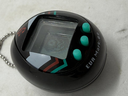 Bandai Tamagotchi Neon Genesis Evangelion EVA Mark.06 Black Virtual Pet, New Battery - Thrift GoblinToy