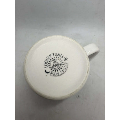 1994 Looney Tunes Sagittarius coffee cup, ceramic mug with faded logo, great for collectors of drinking cups.