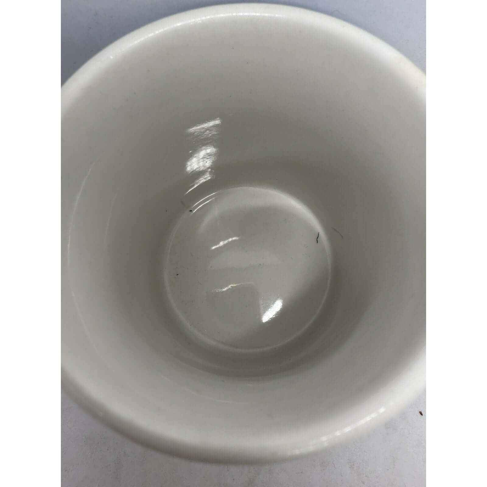 Inside view of a 1994 Looney Tunes Marvin The Martian coffee cup, ceramic, in good condition for drinking.