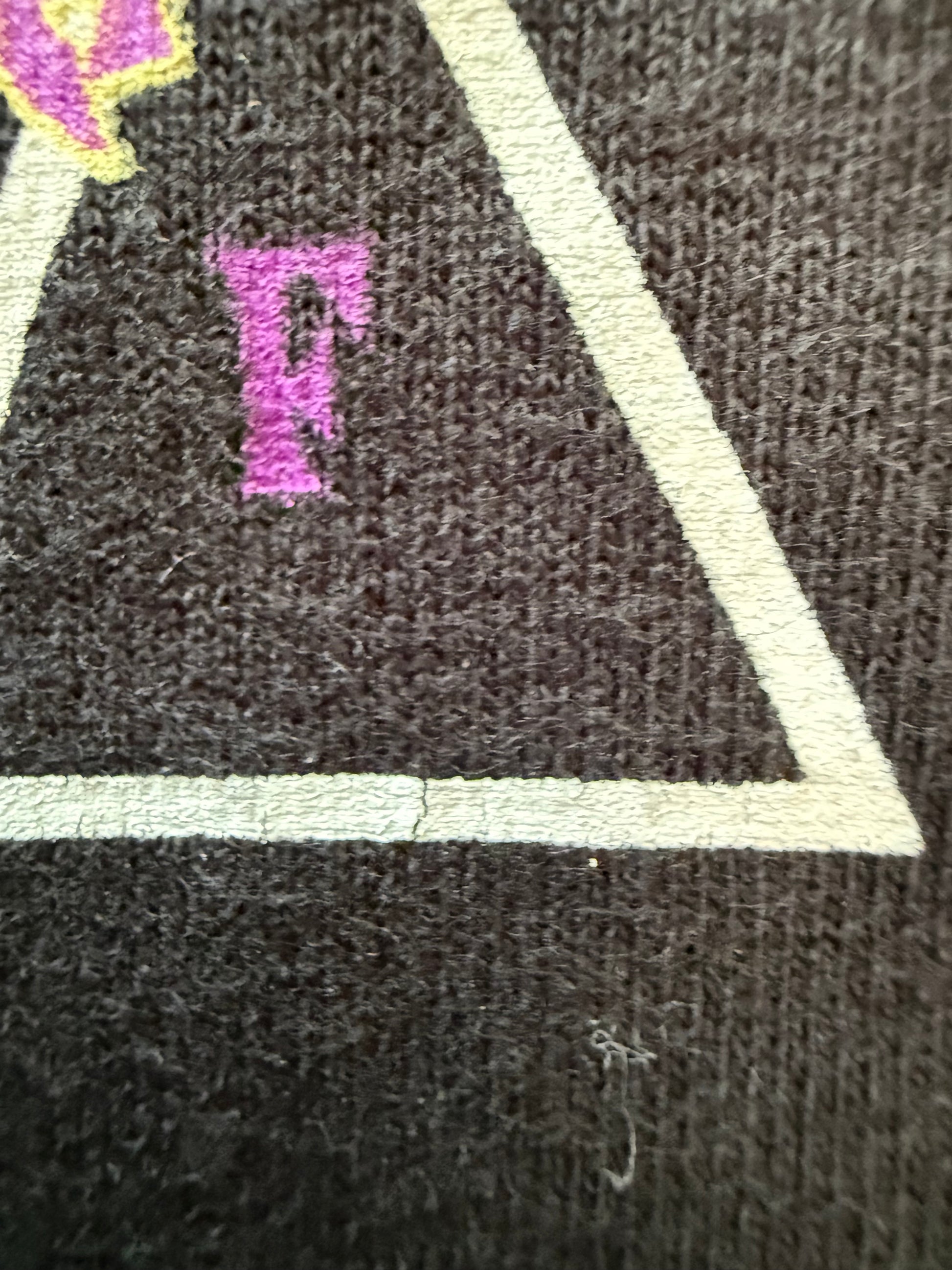 HUF x Erostika tee, print detail showing light cracking
