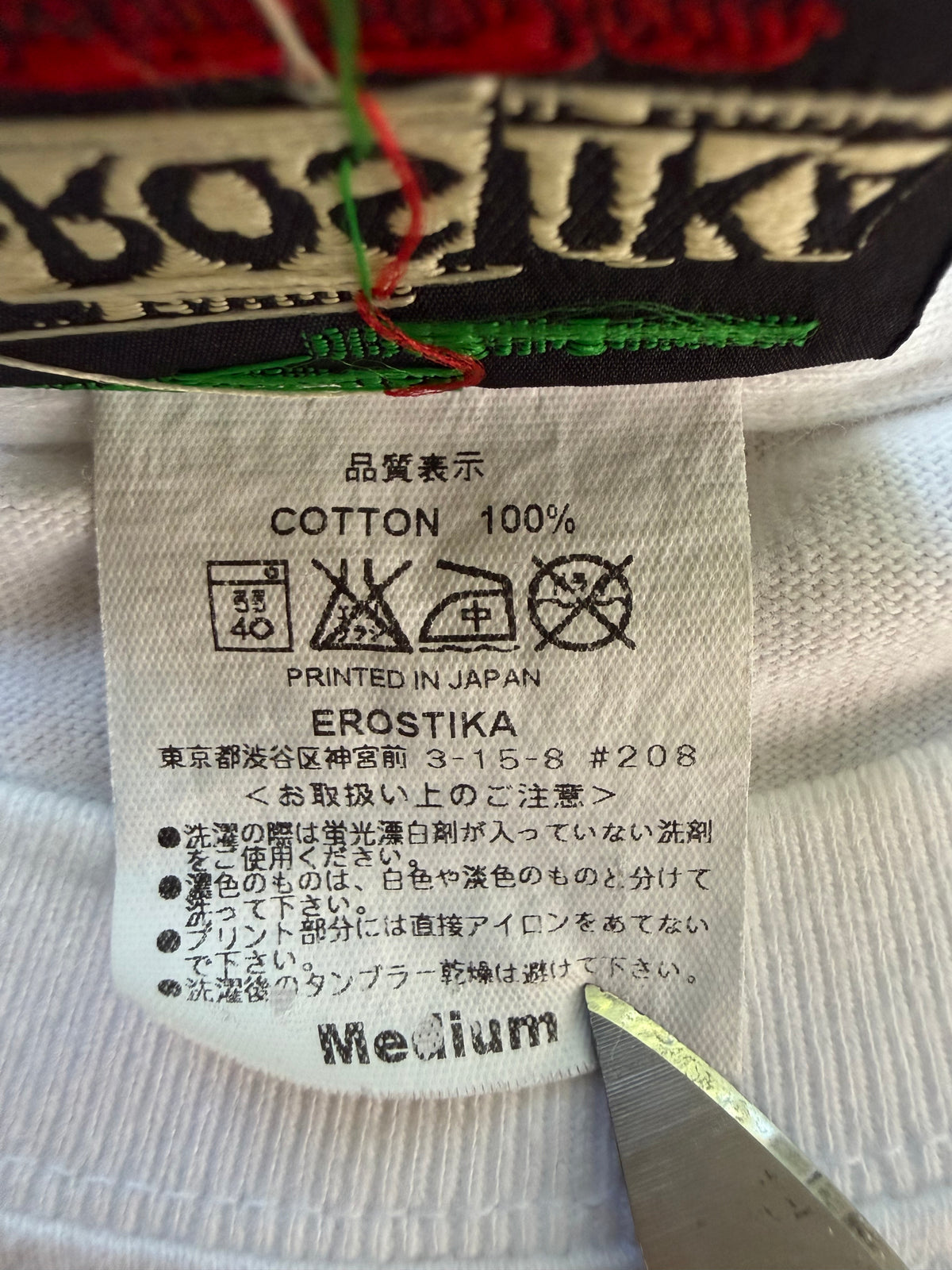 Erostika Devils Cheerleaders tee care tag size Medium made in Japan