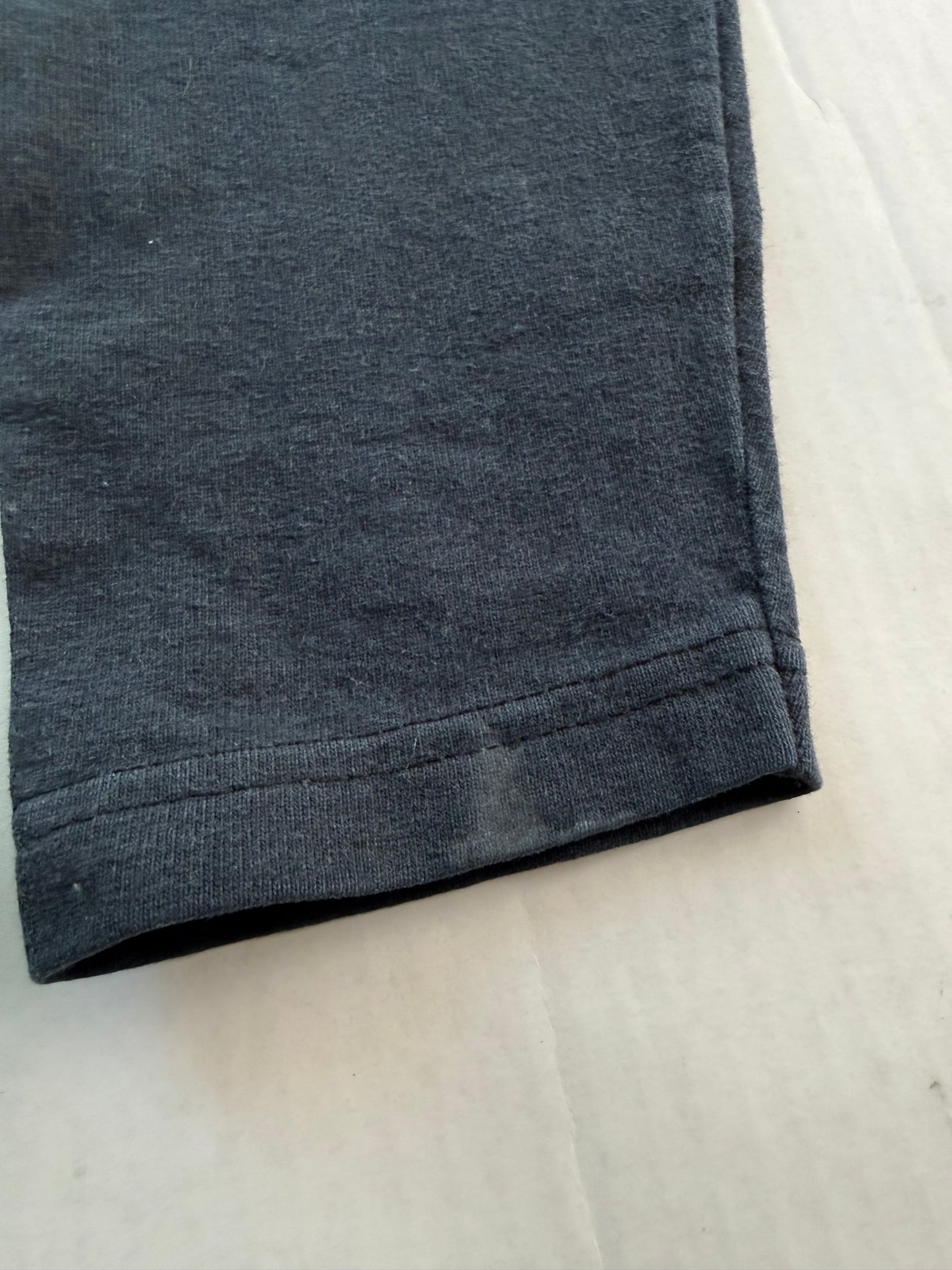 Naughty CheerHeadz tee interior sleeve seam and fading