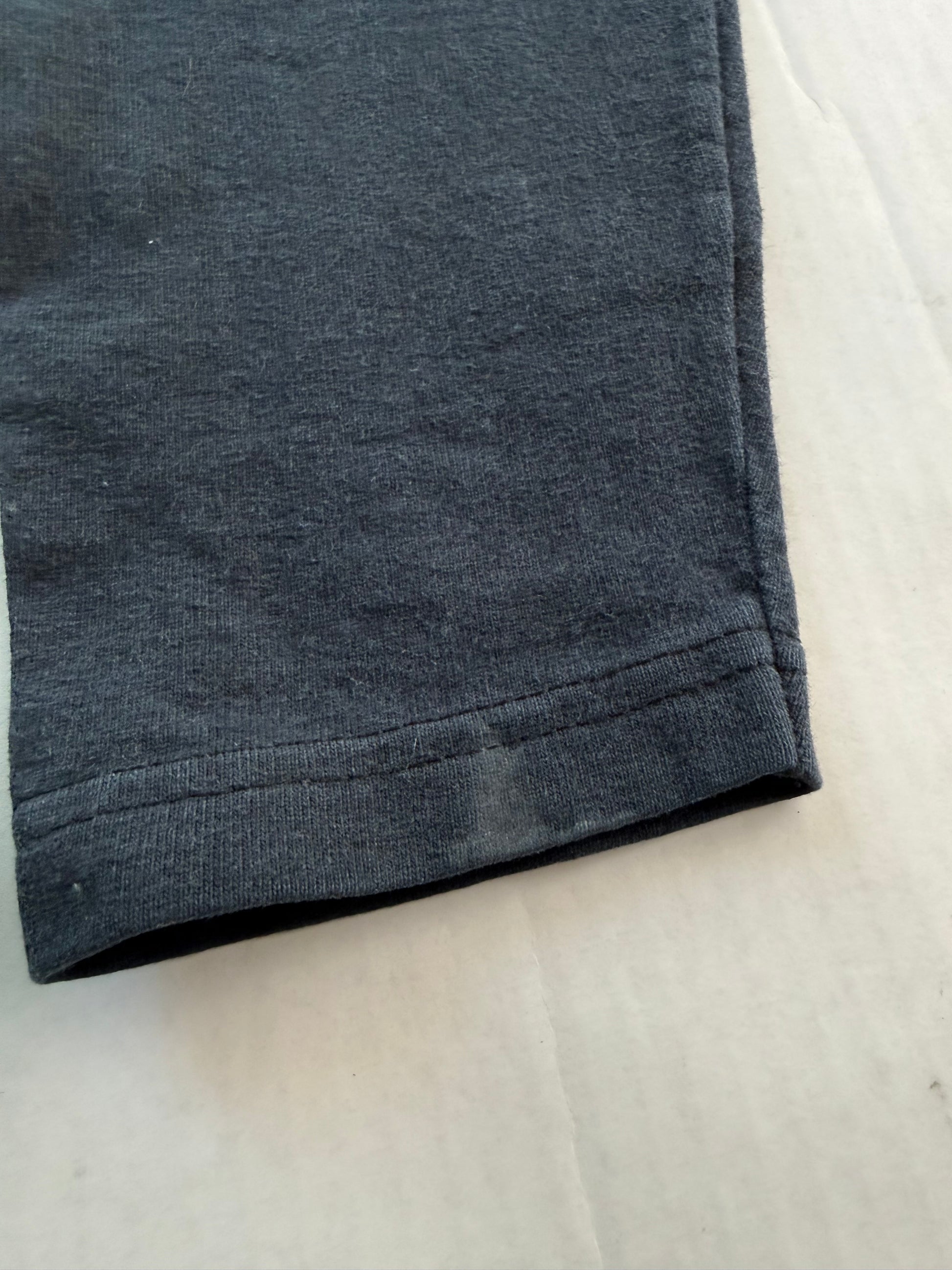 Naughty CheerHeadz tee interior sleeve seam and fading
