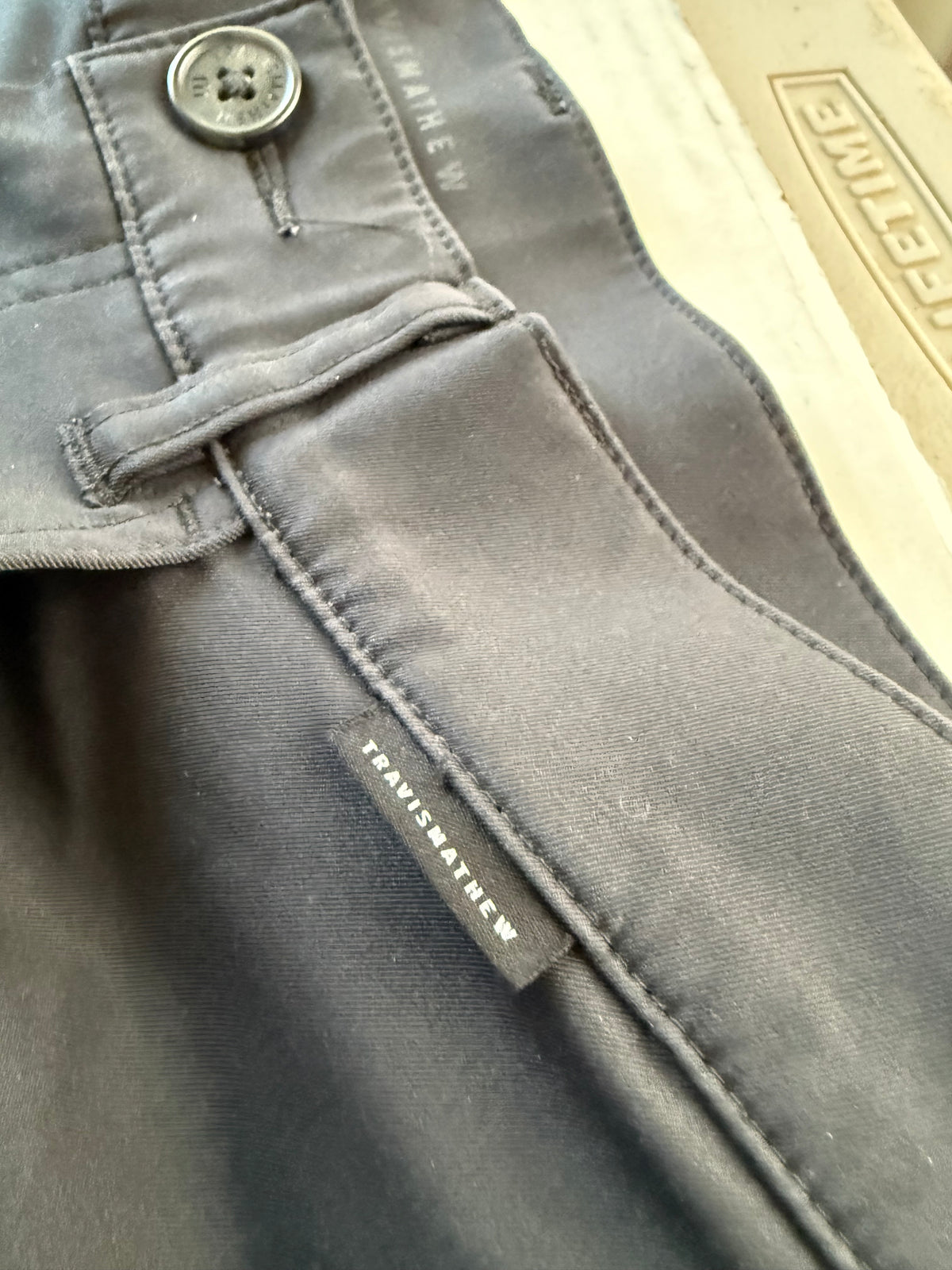 TravisMathew pants stacked