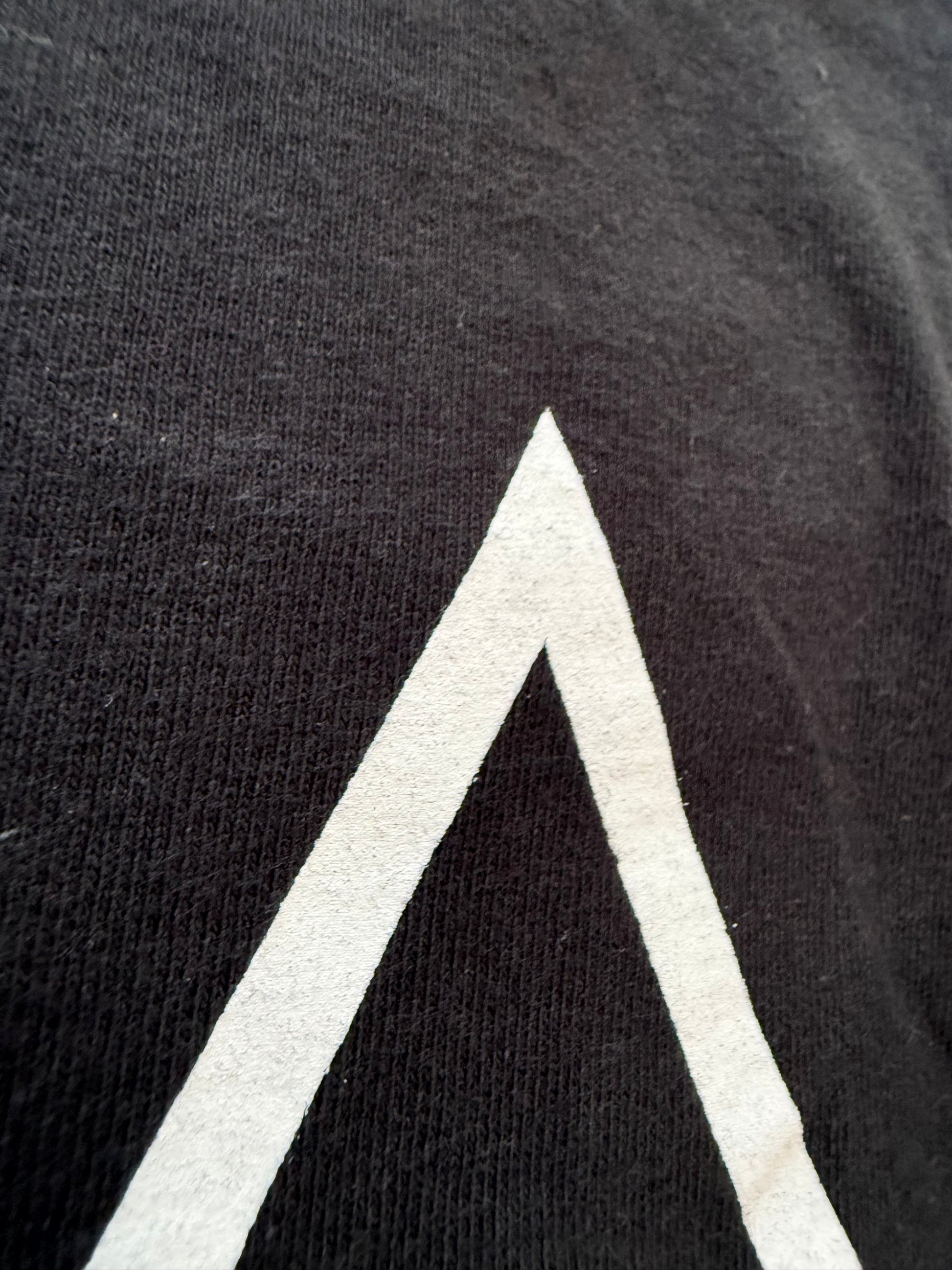 HUF x Erostika tee, care tag made in Honduras