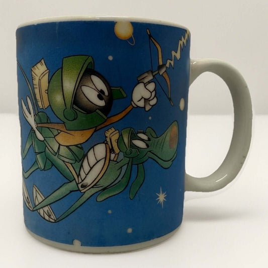1994 Looney Tunes Marvin The Martian coffee mug, faded but readable, ceramic cup ideal for collectors.