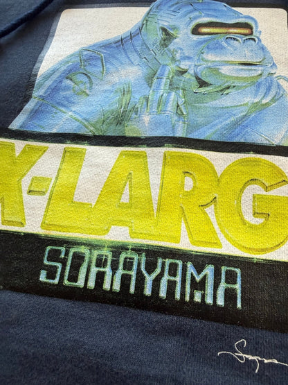 X-LARGE x Hajime Sorayama Chrome Gorilla OG Logo Pullover Hoodie Black Size S - Thrift GoblinHoodie